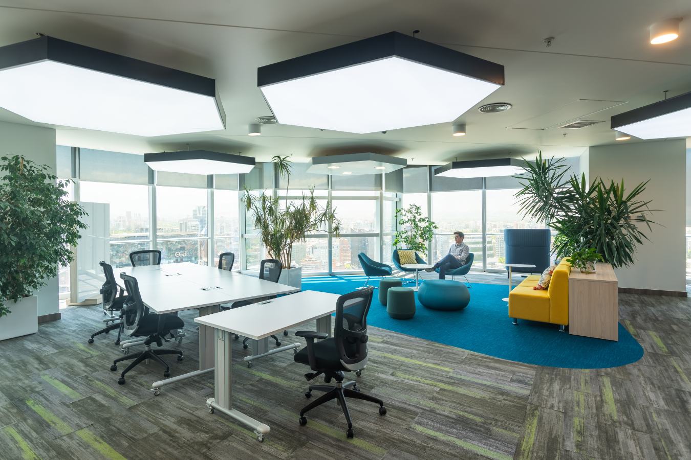 Checkr Offices - Collaborative team workspace with whiteboard walls and hexagonal ceiling lights - Contract Workplaces.jpg